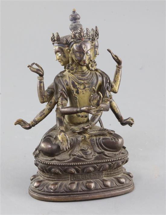 A Sino-Tibetan parcel gilt bronze seated figure of Avalokiteshvara, 18cm